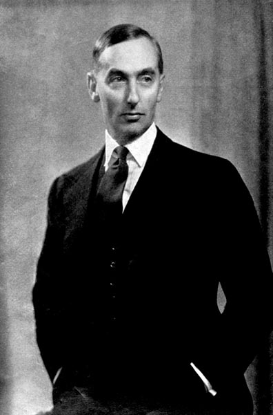 Black and White image of Jack Longland in a formal suit