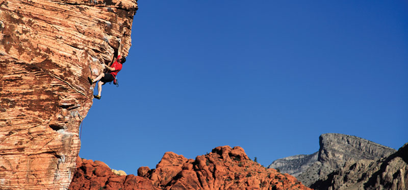 Robin Nicholson in a fine position on the extremely photogenic arete of Caustic (5.11b) at Cannibal Crag. Photo: Mike Hutton