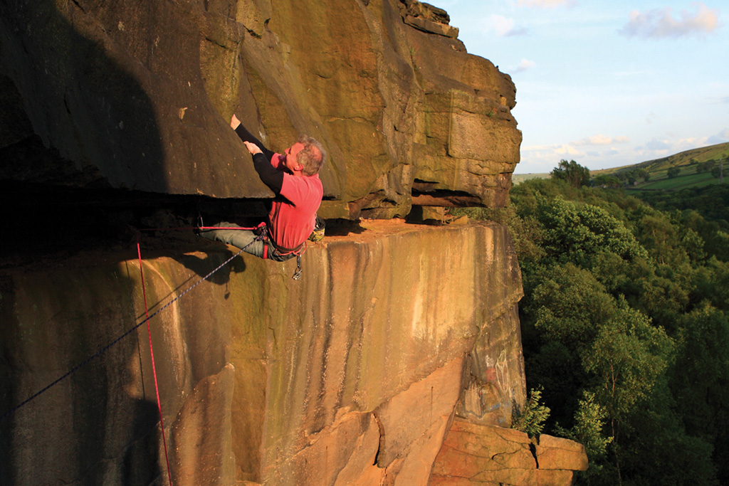 Climbing legend, Jerry Peel, pulls through the brutal roof section on Skulduggery (E3 5c). Photo: Mike Hutton