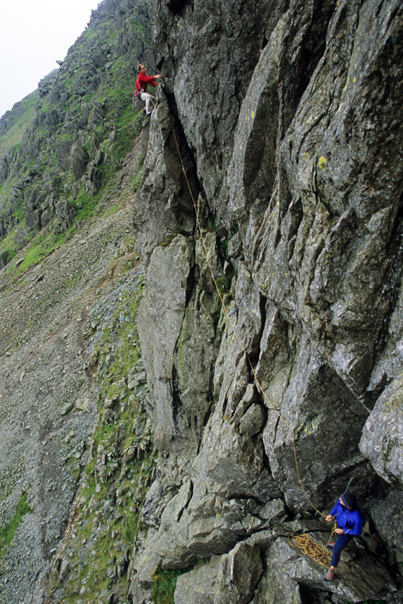 Nick Wharton and Brian Davison on the flake crack of the third pitch of Murray's Route (S), Dow Crag. Photo: Keith Sharples