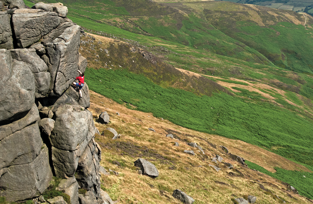 Exquisite climbing in a beautiful moorland setting. Jon Barton enjoying Upper Tor Wall (HS 4b). Photo: Keith Sharples